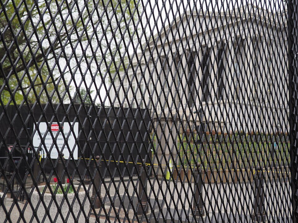 FILE PHOTO: The U.S. Treasury Building in Washington, seen from behind a fence, April 2025.